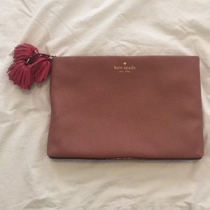 Nutmeg colored leather pouch with pink tassels!
